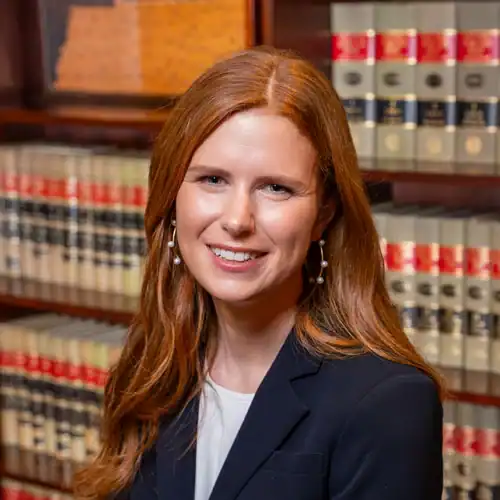 Attorney in library with legal books at Bonano & Associates.