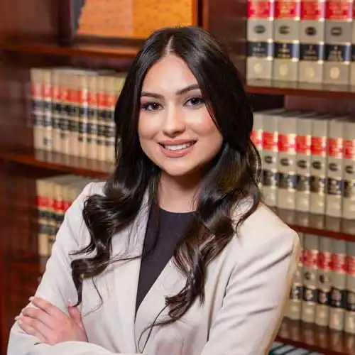 Legal professional in a law library setting.